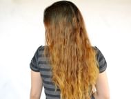 Lemon juice to lighten hair (Image via Getty Images)